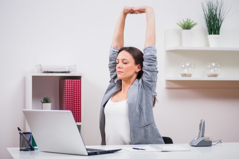 Stretches To Do While Sitting at Your Desk (And Staying Seated!)